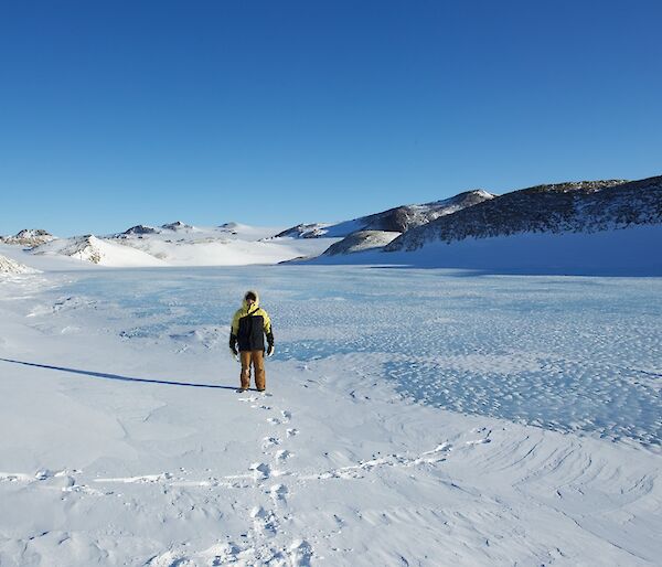 Pete standing on frozen freshwater lake