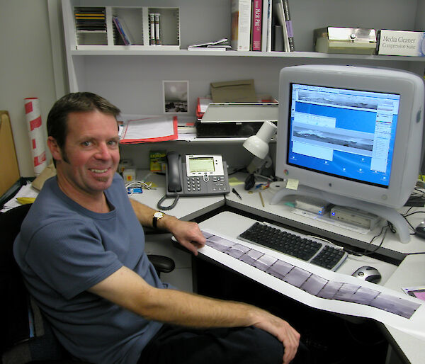 Wayne Papps sitting at a computer