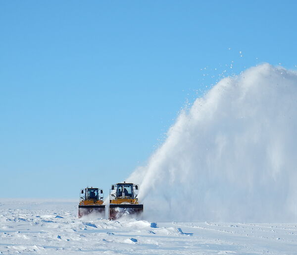 Snow blowers at work on the Wilkins runway