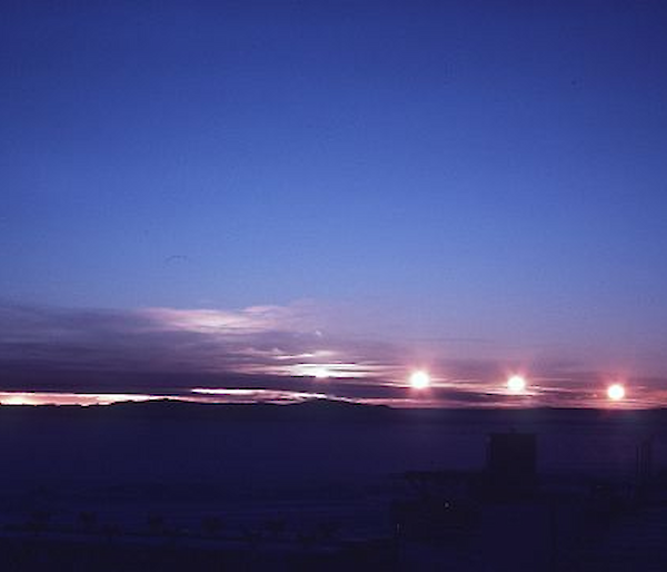 Timelapse photo of midnight sun skimming across horizon