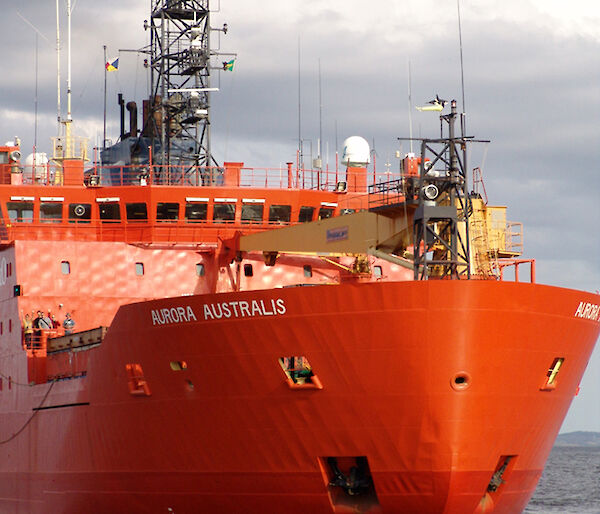 The bow of the red Aurora Australis in open water.