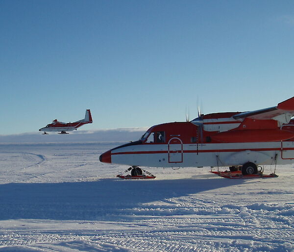 Two CASA 212 planes on the ice