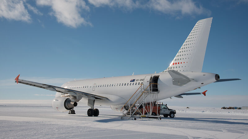 A plane’s cargo is unloaded on Antarctic ice runway