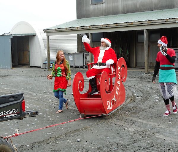Santa arrives on Christmas day at Macqurie Island station in a sleigh