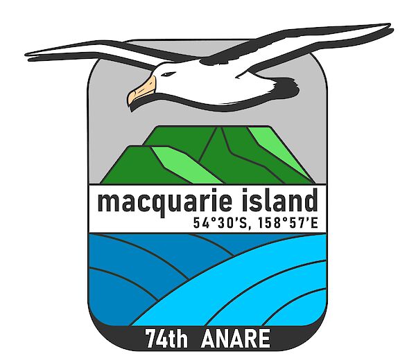 A graphic of an albatros flying over an island and sea with Macquarie Island and it's latitude and longitude written on a banner across the middle.  The words 74th ANARE are also typed at the bottom of the image.