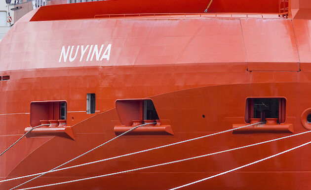 Close-up of Nuyina’s hull with ropes coming out