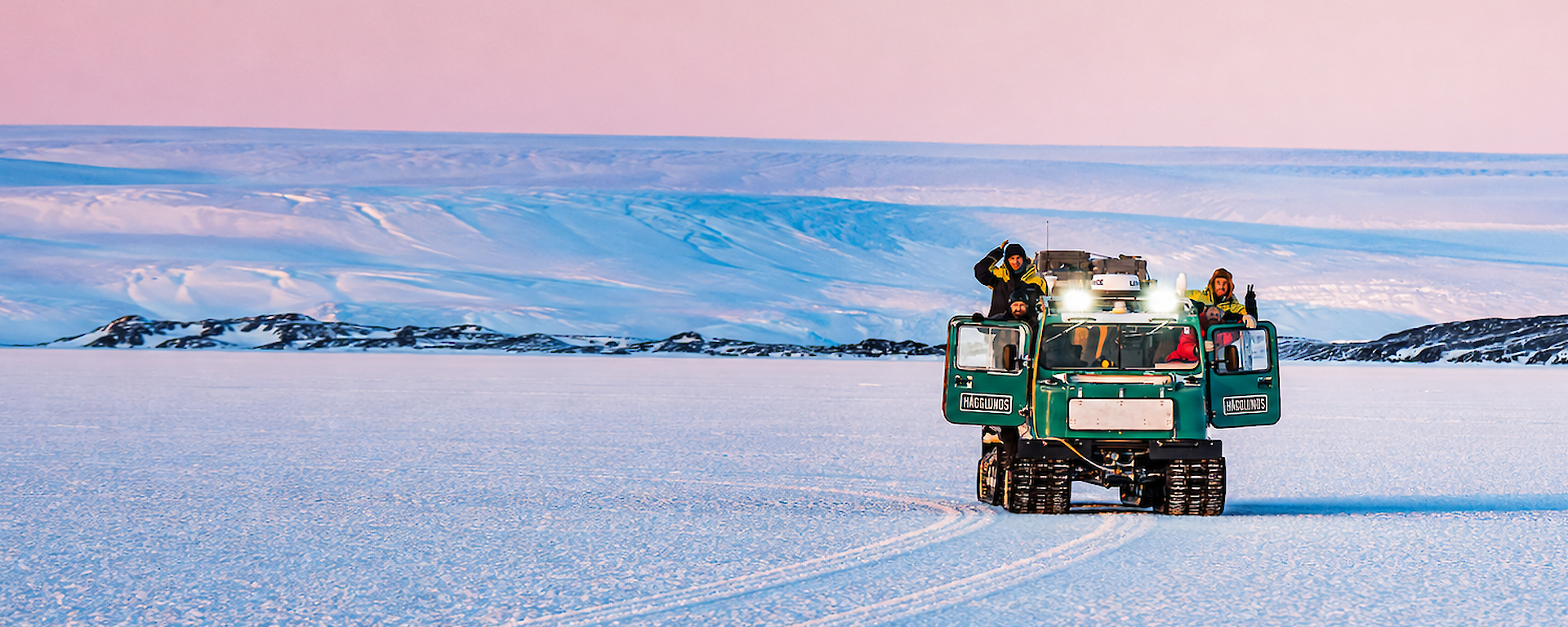 Expeditioners use a Hagglunds to travel across the ice