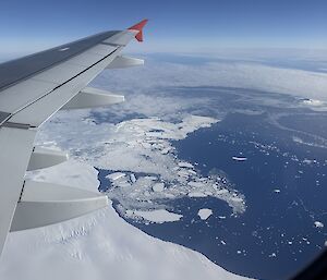 A view of Antarctica from the window of a plane