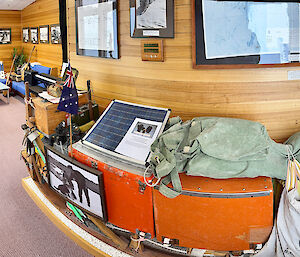 a panoramic view of Mawson's Dog Room which is full of historic ANARE memorabilia and displays, including an original dog sled