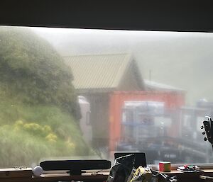 The same image as Image 1 but the window is dirty and harder to see through.