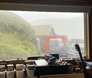 The same image as Image 1 with rain drops on the window.