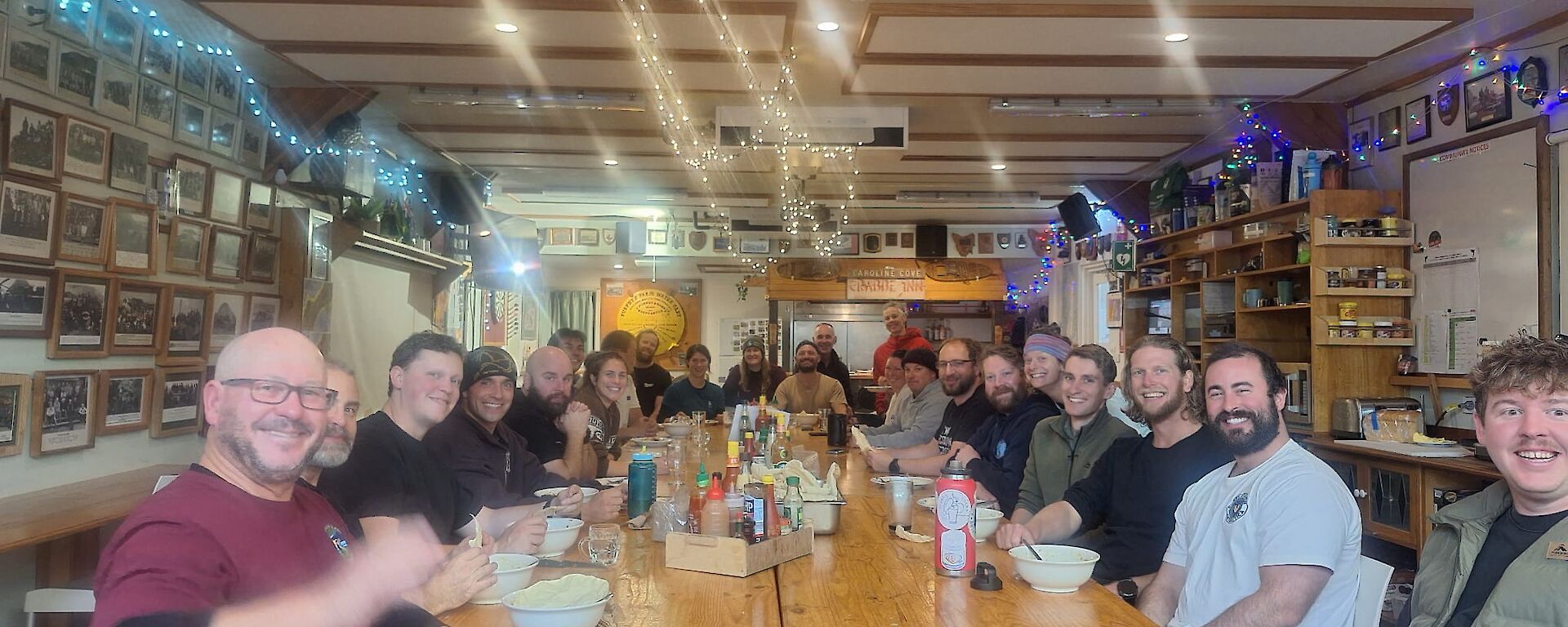 A group of people sitting around a large table