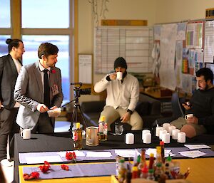 A few expeditioners enjoying gunfire coffee before the service