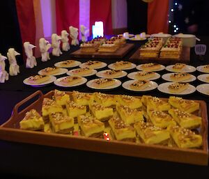 Four different dessert dishes on display in the dining area