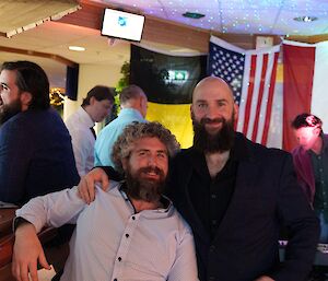 Two expeditioners posing together for the camera.