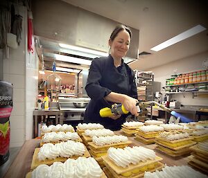 Chef Jordan putting the finishing touches on one of the desserts.