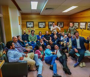 All of Mawson's expeditioners having a casual group photo in the historic 'Dog Room'
