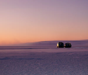 A Hagglund parked on the sea ice, before expeditioners conduct a test drilling to see how thick the sea ice is