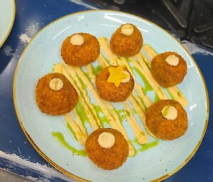 Another kind of croquette on a plate