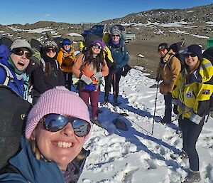 8 female Antarctic expeditioners about to embark on a field travel trip to Brooke’s hut.