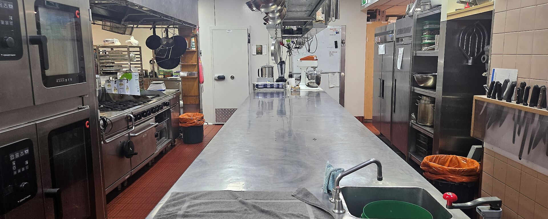 A sparkling clean kitchen with all the stainless steel spotless