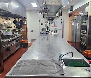 A sparkling clean kitchen with all the stainless steel spotless