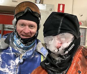 Plant operator Matt Irving and boilermaker Cam Bennett arrive at work after battling a winter blizzard