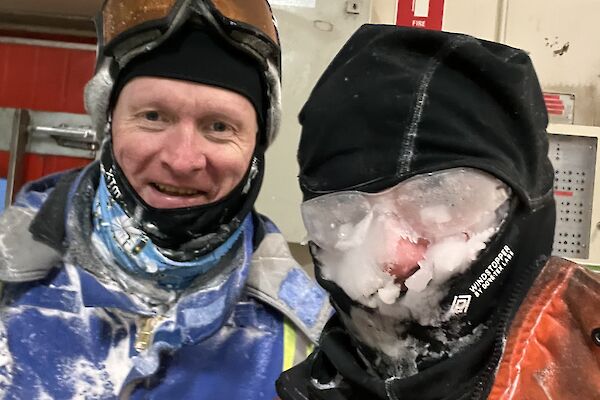 Plant operator Matt Irving and boilermaker Cam Bennett arrive at work after battling a winter blizzard