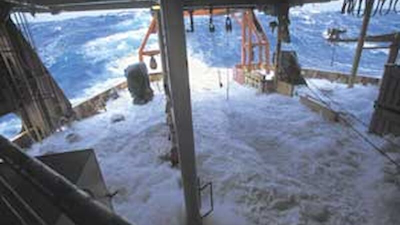 Over a metre of water floods the trawl deck of the Aurora Australis