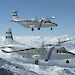 Two C212 aeroplanes in flight