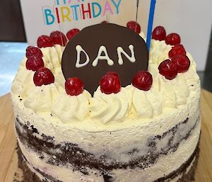 A picture of a black forest birthday cake