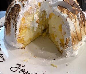A picture of a birthday Lemon Bomb Alaska (Post being set alight)