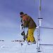 Expeditioner setting up an Automatic Weather Station