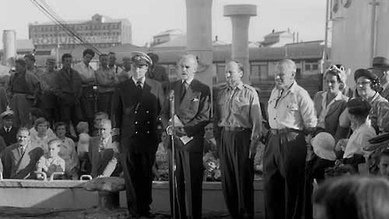 Casey’s farewell speech for departure of Kista Dan, Port Melbourne, December 1954. Others are (l to r) Captain Hans Petersen, Phillip Law (Voyage Leader and Director, Antarctic Division) and John Béchervaise (Mawson Officer-in-Charge, 1955)