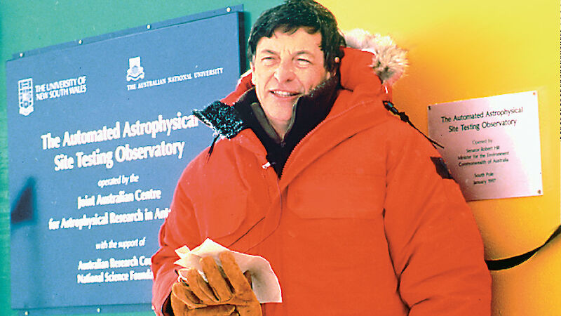 Minister wearing red Antarctic gear