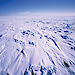 Large expanse of pack ice, with a seal visible in the bottom right corner