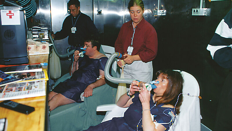 Expeditioners are tested my medical staff in an extremely cold room prior to heading south