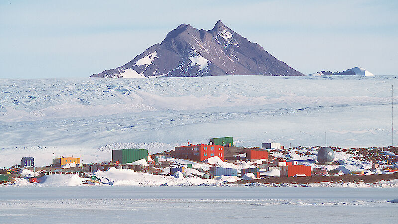 View of Mawson station buildings with Frammes Mountains behind