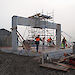 Tradesmen working on the building site for the new ARPANSA powerhouse on Macquarie Island.