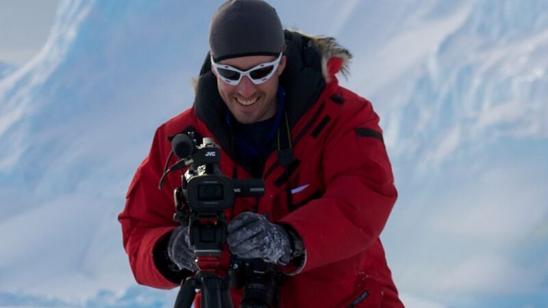 Nick Roden photographs an emperor penguin.