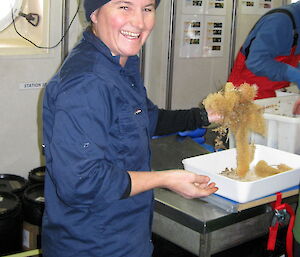 Biologist Kirrily Moore with a sample from the deep.