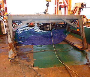 The beam trawl with still and video cameras mounted.