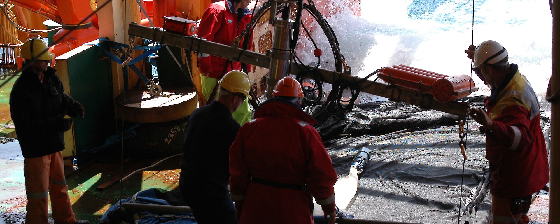 Retrieving the rectangular mid-water trawl off the deck of the Aurora Australis