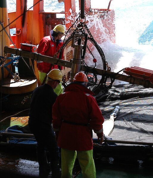 Retrieving the rectangular mid-water trawl off the deck of the Aurora Australis