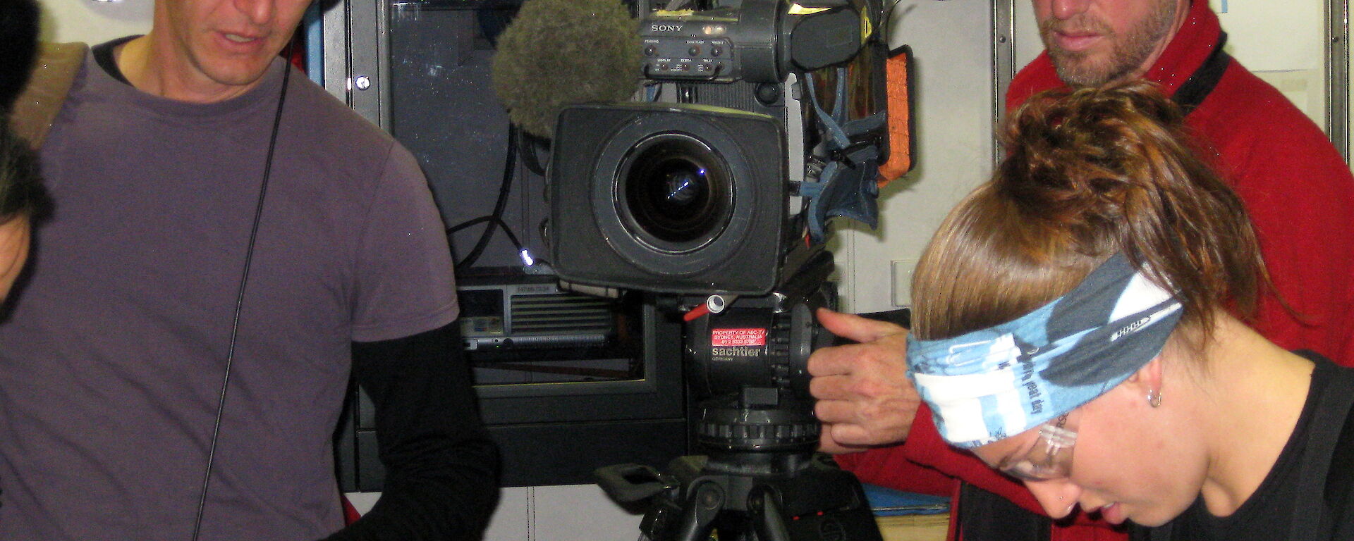 Mark and Kevin at work filming a marine science story on board the Aurora Australis.