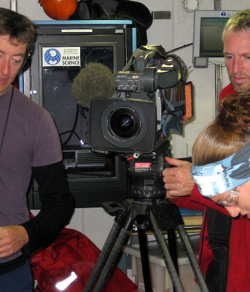 Mark and Kevin at work filming a marine science story on board the Aurora Australis.