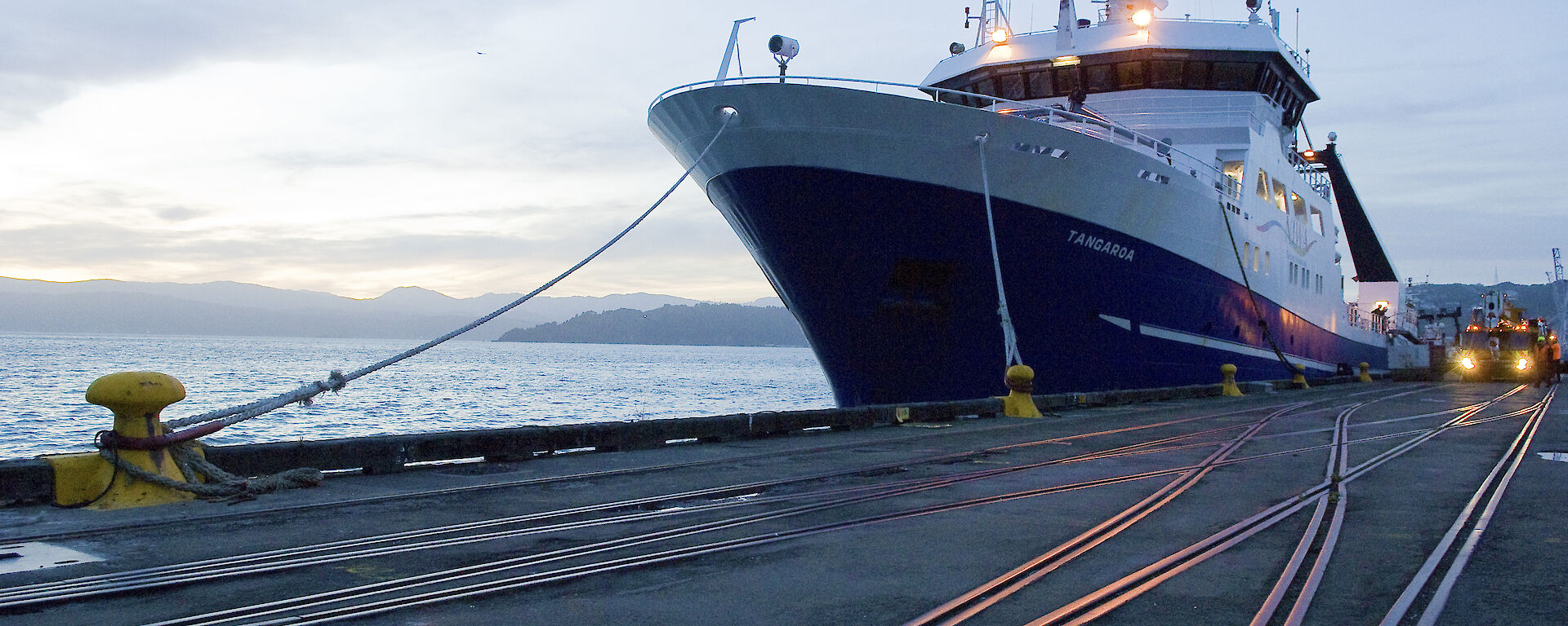 Ship docked alongside wharf