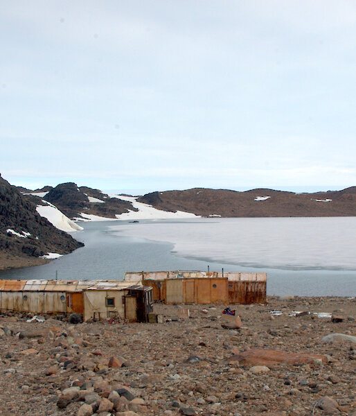 The old Polish buildings that make up Oasis station, overlooking Algae Lake, and a supply of empty gas bottles (right), used for heating and cooking.