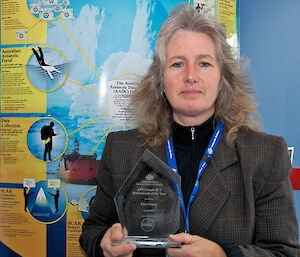 Kim Finney with her award for Female ICT Professional of the Year