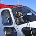 David Pullinger in his helicopter in Antarctica